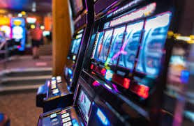 nonton77 slot game interface showing reel layout, stake controls, and spin button